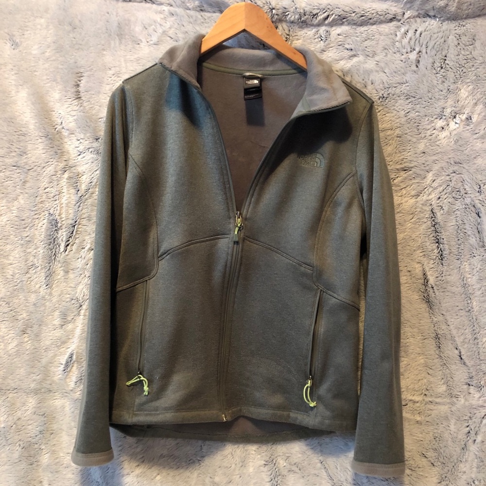 Green north face zip up